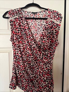 Nine West coral/Pink and Black Leopard Print Surplice dress top.